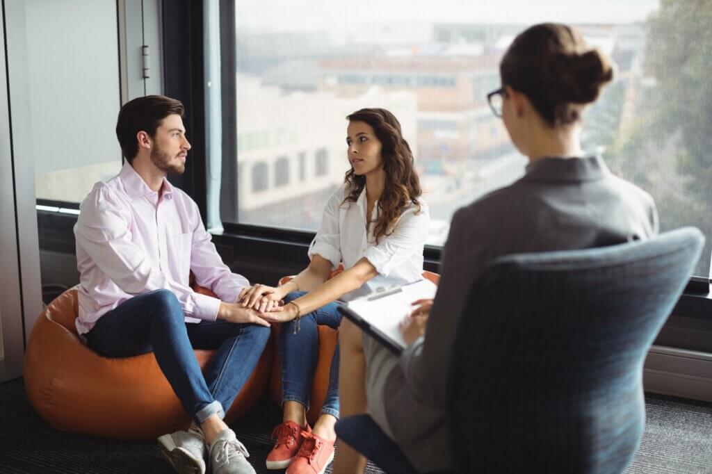 Couple talking to a marriage counselor